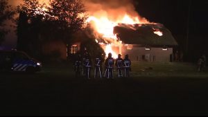 Rieten dak in brand